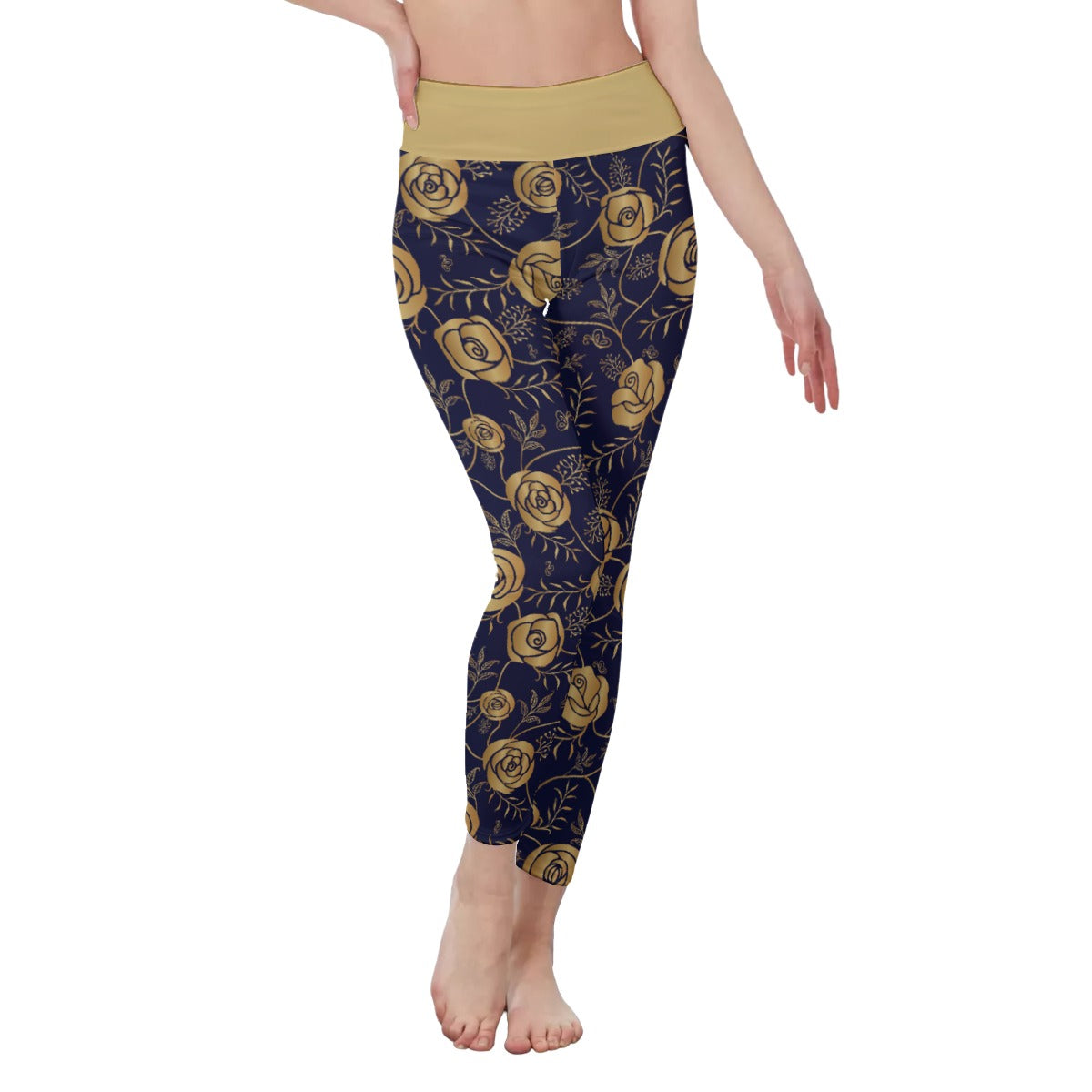 Front view of model from waist down wearing black leggings with a gold rose all over print design. The waist band is colored the same gold as the roses.
